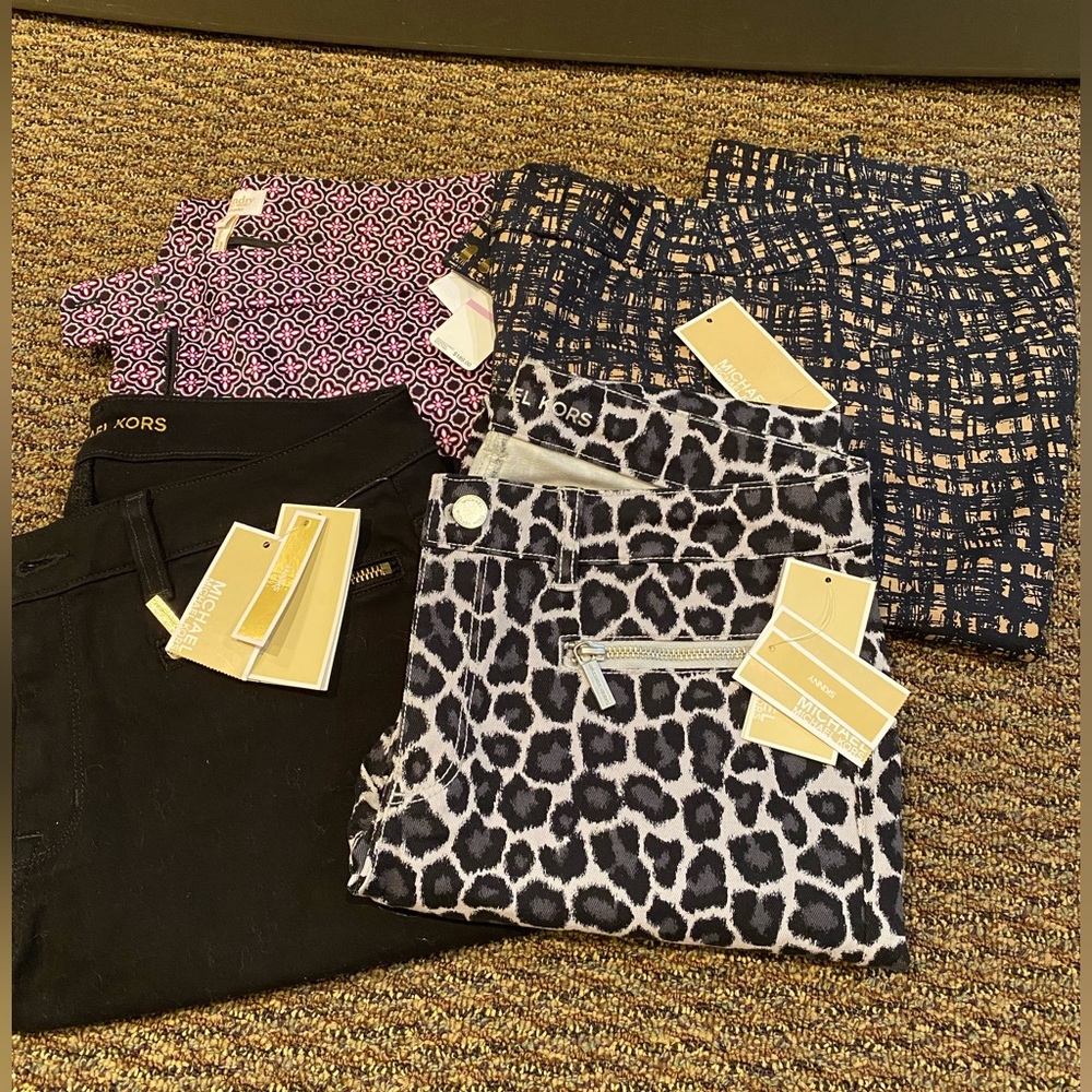 4 pairs of pants. 3 Michael Kors Pants and 1 Chinese Laundry